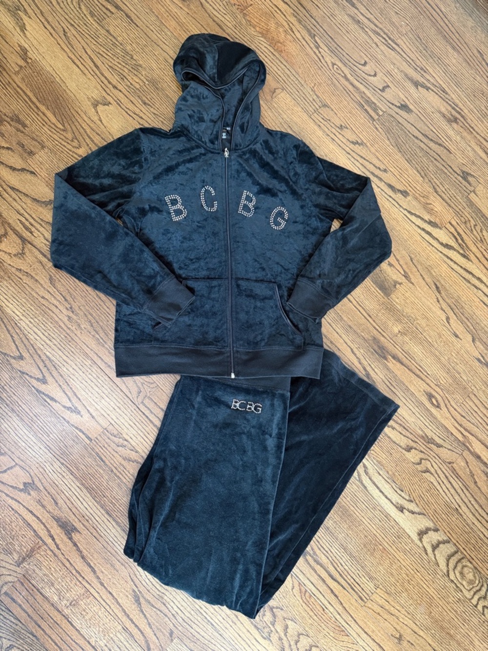 vintage black BCBGMaxazria velour full-zip hoodie with a studded rhinestone logo